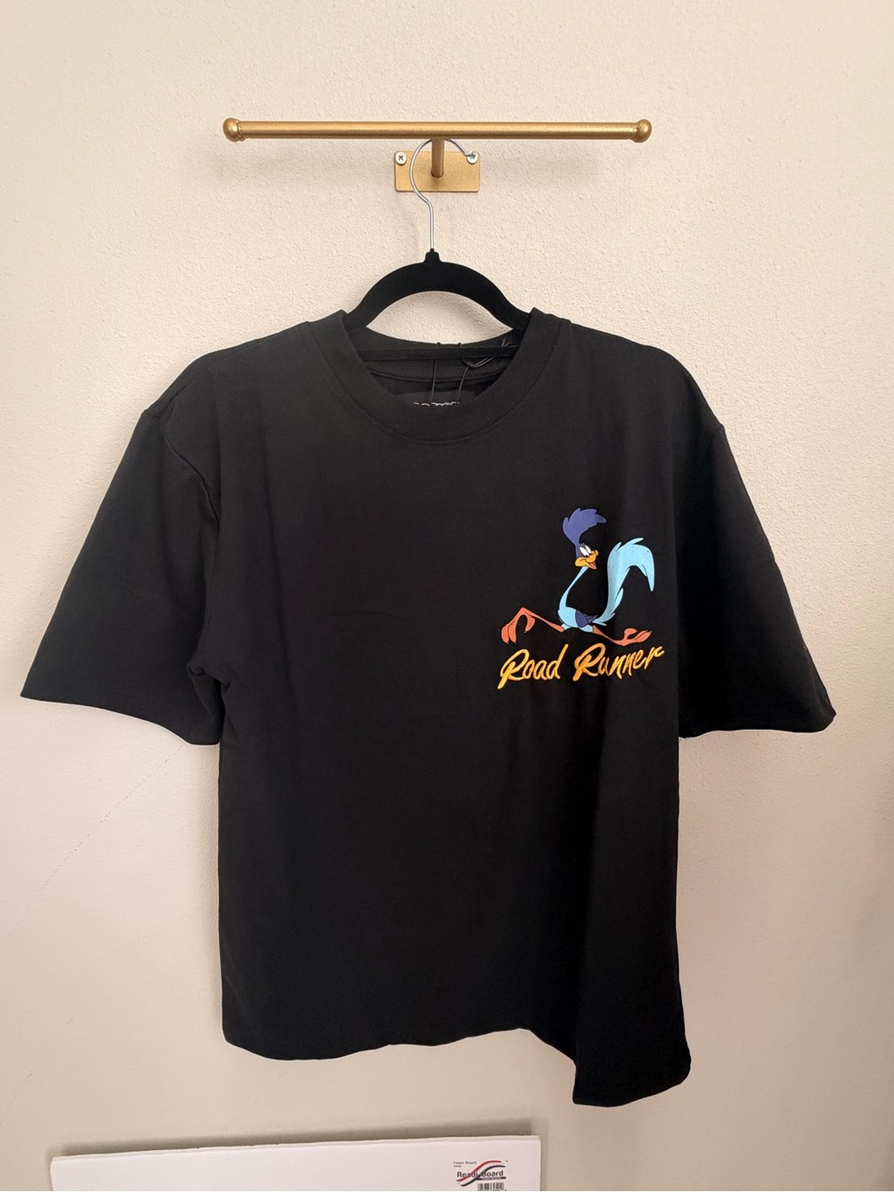 Warner Bros. Black Road Runner Graphic Tee with Yellow Embroidery